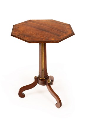 Lot 645 - A Regency rosewood octagonal table, banded in...