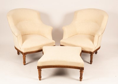 Lot 648 - A pair of upholstered armchairs and matching...