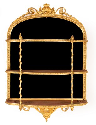 Lot 658 - A 19th Century mirror back étagère with shell...