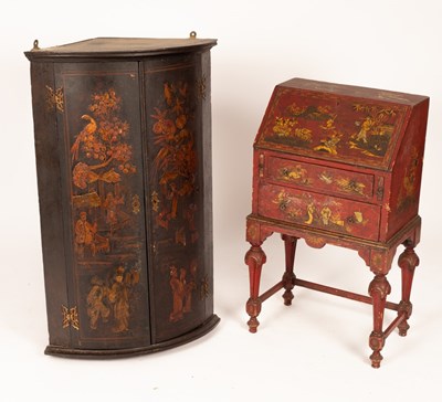 Lot 664 - A Chinoiserie black, red and gold lacquer...