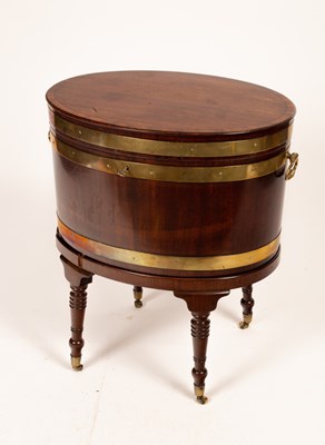 Lot 671 - A Regency mahogany brass bound wine cooler...