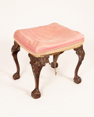 Lot 696 - A 19th Century carved walnut stool on carved...