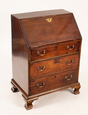 Lot 719 - A George III mahogany bureau, the fall-flap...