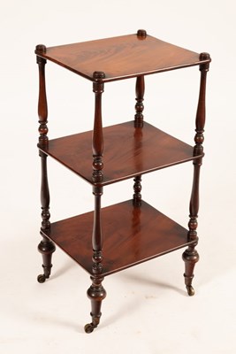 Lot 720 - An early Victorian mahogany three-tier whatnot...