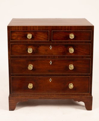 Lot 722 - A Regency mahogany chest, the crossbanded and...