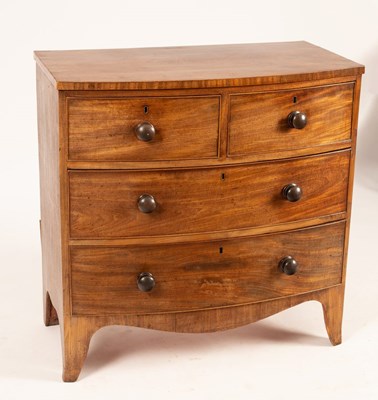 Lot 725 - A Regency mahogany bowfront chest, the top...