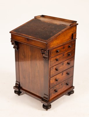 Lot 726 - An early Victorian rosewood Davenport, the...