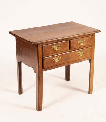 Lot 729 - A mid 18th Century walnut lowboy, the...