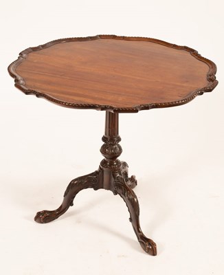 Lot 734 - A George III style mahogany tripod table, the...