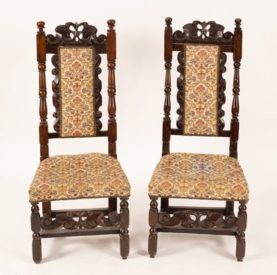 Lot 738 - A near pair of Jacobean style stained oak...