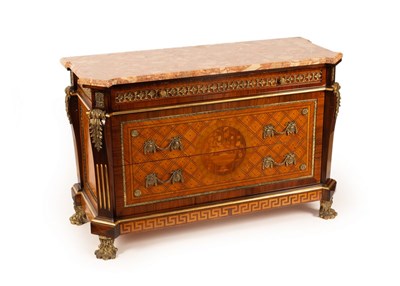 Lot 755 - A Louis XVI style gilt metal mounted commode,...