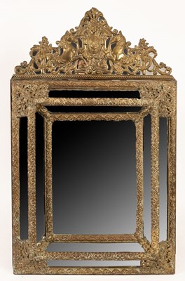 Lot 763 - A Continental style repoussé brass framed...