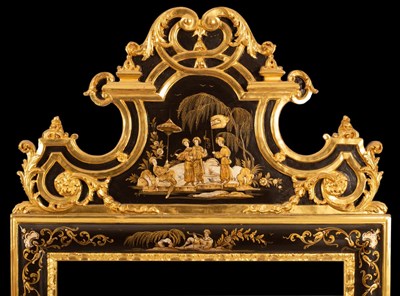 Lot 767 - A lacquer and gilt framed wall mirror of...