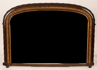 Lot 778 - An arch framed overmantle mirror fitted a...