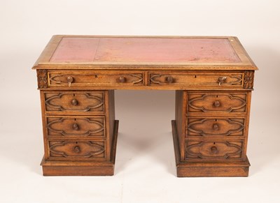 Lot 785 - A Gothic Revival pedestal desk, fitted eight...