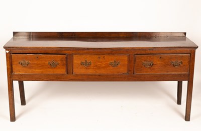 Lot 809 - A George III oak dresser, circa 1760, the...