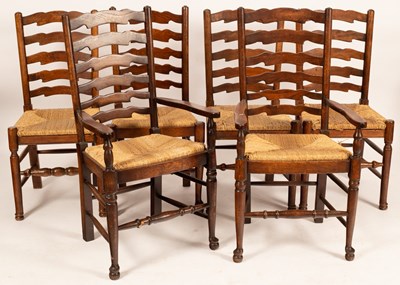 Lot 830 - A set of six oak ladder back chairs with drop...