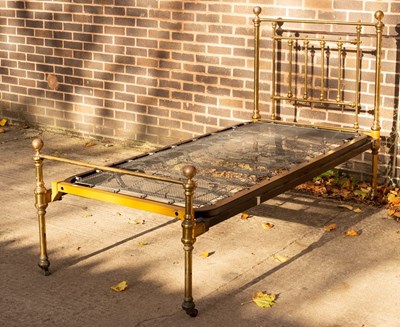 Lot 834 - A Victorian brass single bedstead, with ball...