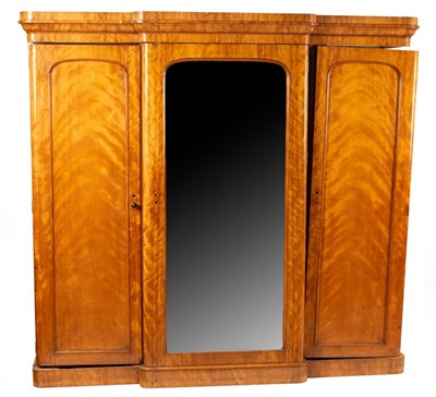 Lot 843 - A Victorian satinwood breakfront triple...