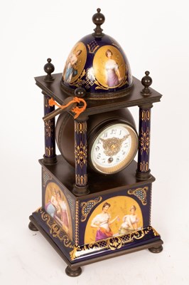 Lot 870 - A late 19th Century mantel clock, the dome top...