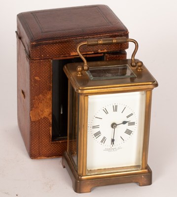 Lot 871 - An eight-day brass carriage clock, Finnegans...