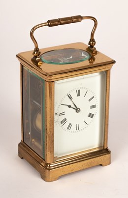 Lot 872 - A gilt cased eight-day carriage clock with...