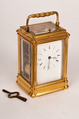 Lot 873 - A gilt brass eight-day, half-hour repeat, hour...