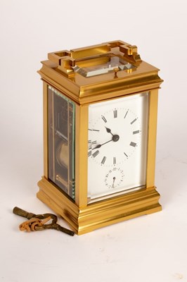 Lot 874 - A gilt brass eight-day carriage alarm clock,...