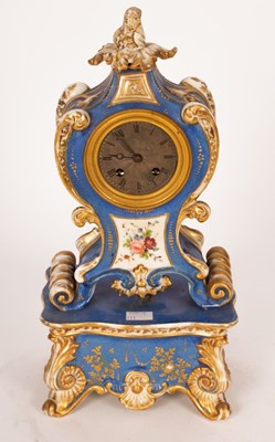 Lot 884 - A Paris porcelain cased mantel clock, the...