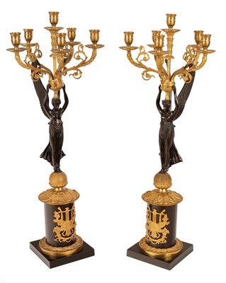 Lot 995 - A pair of Empire style bronze and gilt metal...