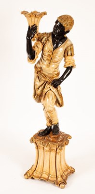 Lot 996 - A Venetian style figure of a blackamoor...