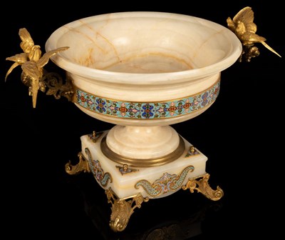 Lot 1002 - An alabaster, gilt bronze and champlevé enamel...