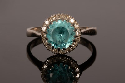 Lot 7 - A blue zircon and diamond cluster ring, circa...