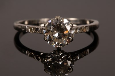 Lot 11 - An Art Deco diamond solitaire ring, the old...