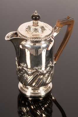Lot 45 - A late Victorian silver hot water jug, London...