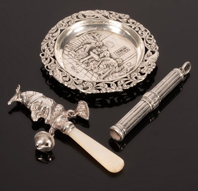 Lot 48 - A small silver novelty rattle modelled as Mr...