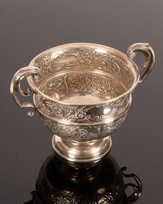 Lot 54 - An Edwardian silver two-handled cup,...
