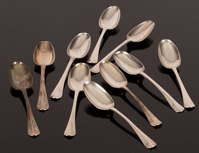 Lot 92 - Ten Queen Anne rattail silver dessert spoons,...