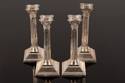 Lot 94 - A set of four silver candlesticks, Birmingham...