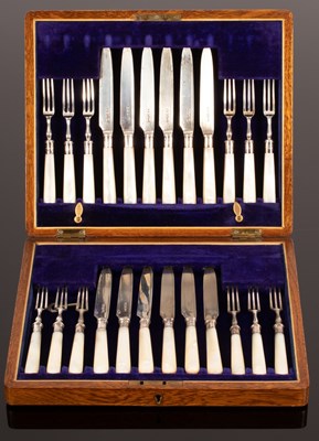 Lot 119 - A cased set of twelve silver dessert knives...