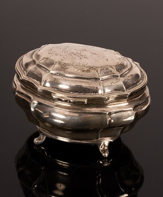 Lot 133 - An oval silver tea caddy, Goldsmiths &...