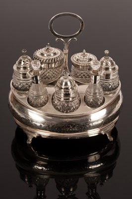 Lot 137 - A George III silver cruet stand, I.B, London...