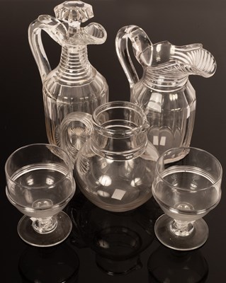 Lot 171 - A step cut neck jug and decanter jug, 21cm and...