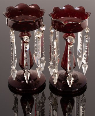 Lot 180 - A pair of ruby glass lustres, with petal cut...