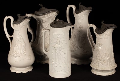 Lot 188 - Five saltware jugs, decorated figures in...