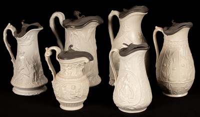 Lot 190 - Six saltware jugs, various patterns, pewter...