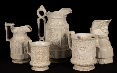 Lot 199 - Five saltware jugs, decorated figures in...