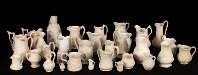 Lot 202 - A quantity of saltware jugs, various patterns,...