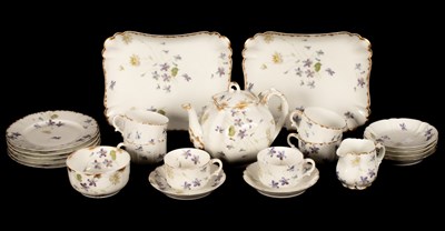 Lot 208 - A Haviland Limoges tea service moulded with...