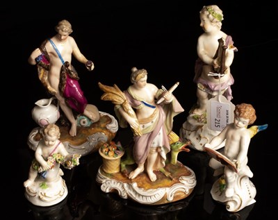 Lot 215 - A Meissen figure of a cherub playing a lyre,...